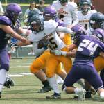 Vikings edge Spartans in comeback win in football season opener