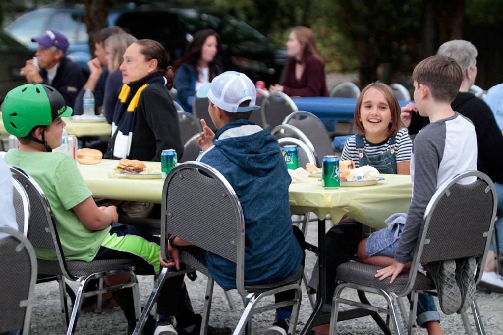 Spartans slay Trojans in year’s first home football win | Photo gallery