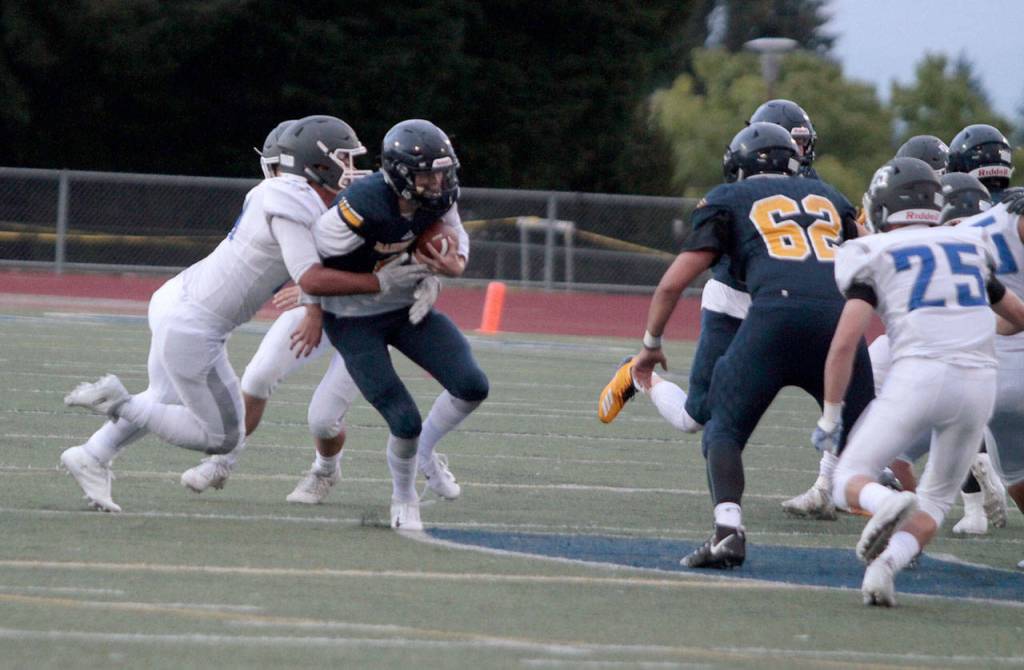 Spartans slay Trojans in year’s first home football win | Photo gallery