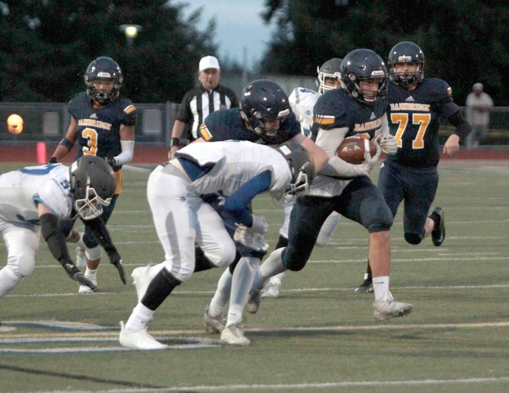 Spartans slay Trojans in year’s first home football win | Photo gallery