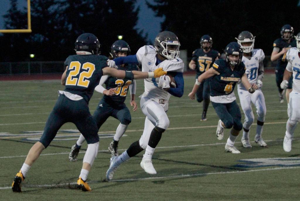 Spartans slay Trojans in year’s first home football win | Photo gallery