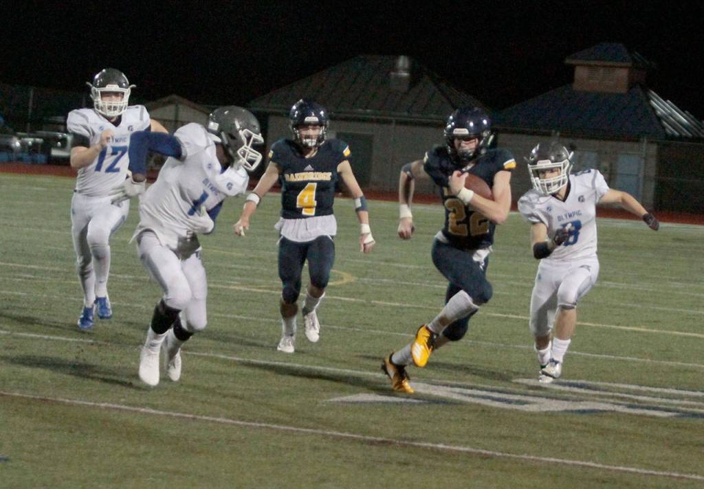 Spartans slay Trojans in year’s first home football win | Photo gallery