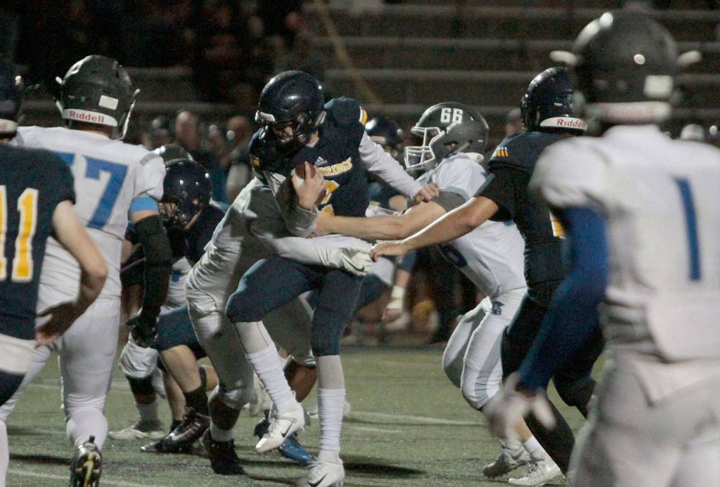 Spartans slay Trojans in year’s first home football win | Photo gallery