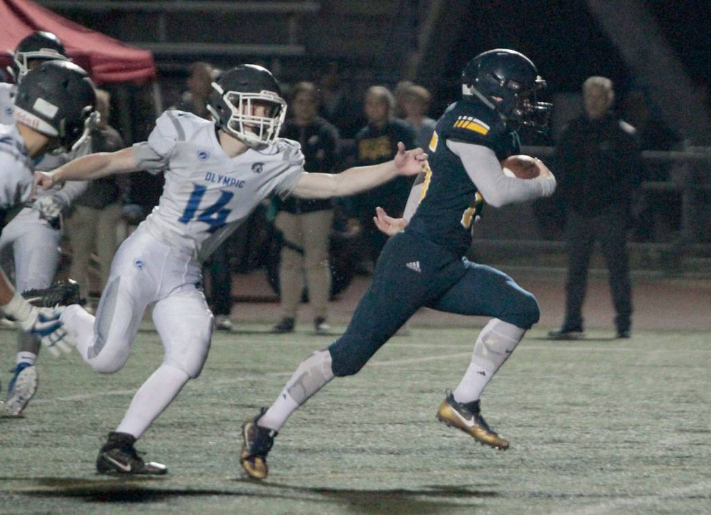 Spartans slay Trojans in year’s first home football win | Photo gallery