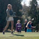 Luciano Marano | Bainbridge Island Review - Bainbridge Highs Catherine Rolfes tees off Monday during the home match against Ingraham.