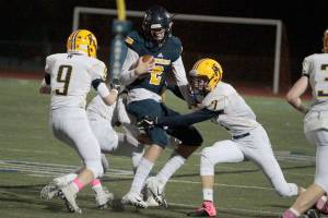 Homecoming heroics: Spartans soar to 40-23 Senior Night football win