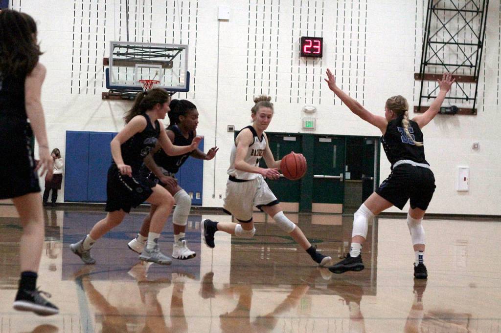 Spartan girls snag big win in season debut | Photo gallery
