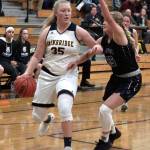 Spartan girls snag big win in season debut | Photo gallery