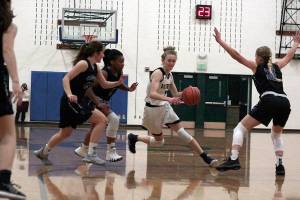 Spartan girls snag big win in season debut | Photo gallery