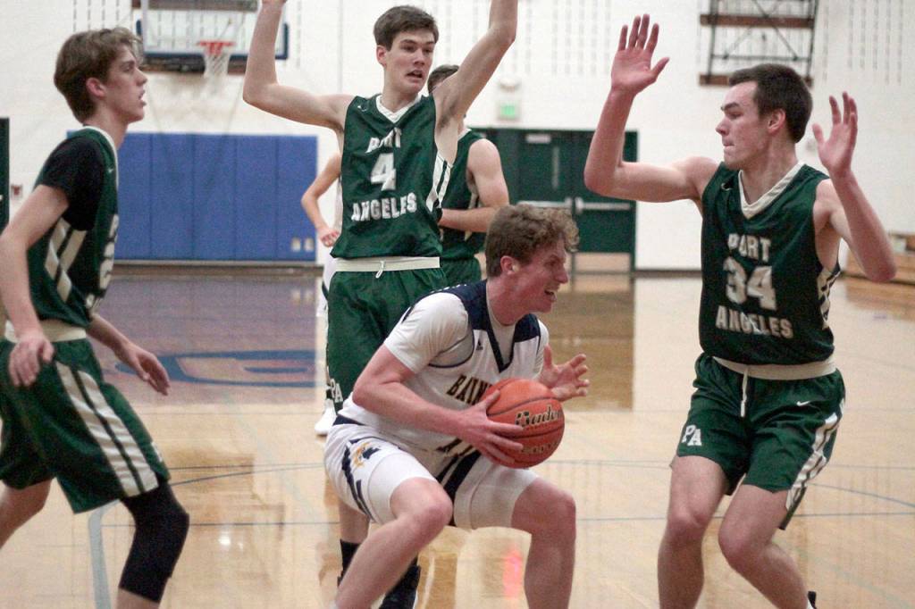 Rough start begins basketball season for BHS boys | Photo gallery