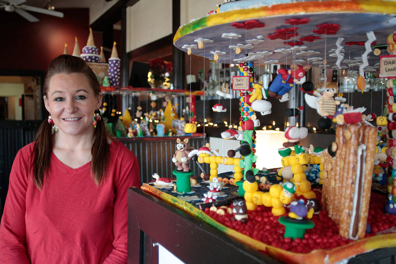 Luciano Marano | Bainbridge Island Review - Longtime Docs Marina Grill server Kolyne Koko Forro chose Super Mario Bros. 3 as the theme for her annual gingerbread creation, on display now at the downtown Winslow eatery.