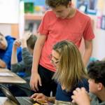 Carrie Newman at Woodward Middle School has received a grant for books for eighth-graders to increase student access to high quality reading materials and increase student interest in reading, and a grant for an online program for eighth-graders to increase skill building in reading and writing. (Photo courtesy of the Bainbridge Schools Foundation)