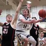 Luciano Marano | Bainbridge Island Review - Spartan senior Jackson Taylor tries for a layup during last Fridays game against Ballard.