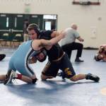 Luciano Marano | Bainbridge Island Review - Spartan team captain Oleg Maguire pinned Interlakes Miguel Ortiz in 2:57 during his first match at this years Island Invitational wrestling tournament Jan. 12. He went on to take first place in his weight bracket (138-pounds).