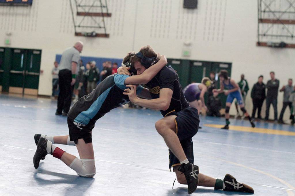 Mat moments: Spartans host home turf wrestling tourney | Photo gallery
