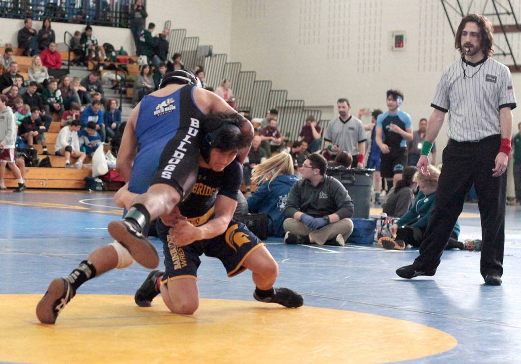 Mat moments: Spartans host home turf wrestling tourney | Photo gallery
