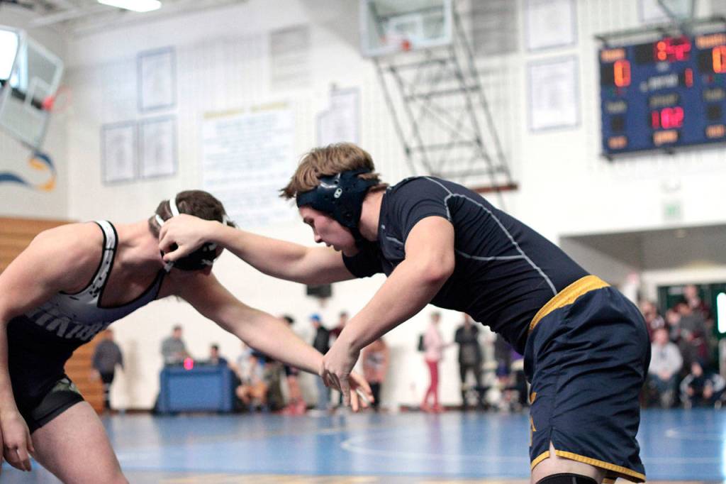Mat moments: Spartans host home turf wrestling tourney | Photo gallery
