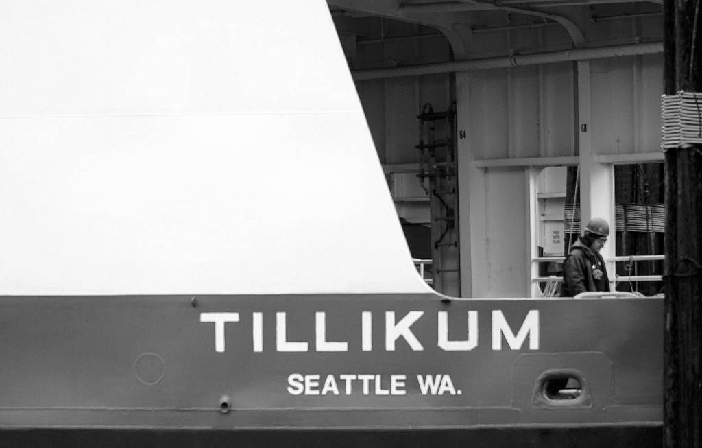 Luciano Marano | Bainbridge Island Review - An Eagle Harbor Maintenance Facility worker leaves the M/V Tillikum following Wednesdays ceremony.