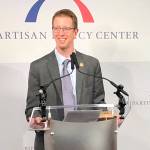 Rep. Derek Kilmer gives an acceptance speech after receiving the Legislative Action Award from the Bipartisan Policy Center this month. (Bipartisan Policy Center photo)