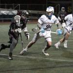 Luciano Marano | Bainbridge Island Review - Bainbridge High School junior Andrew Kenny and junior Ian Morosoff look to intercept a Tualatin player.