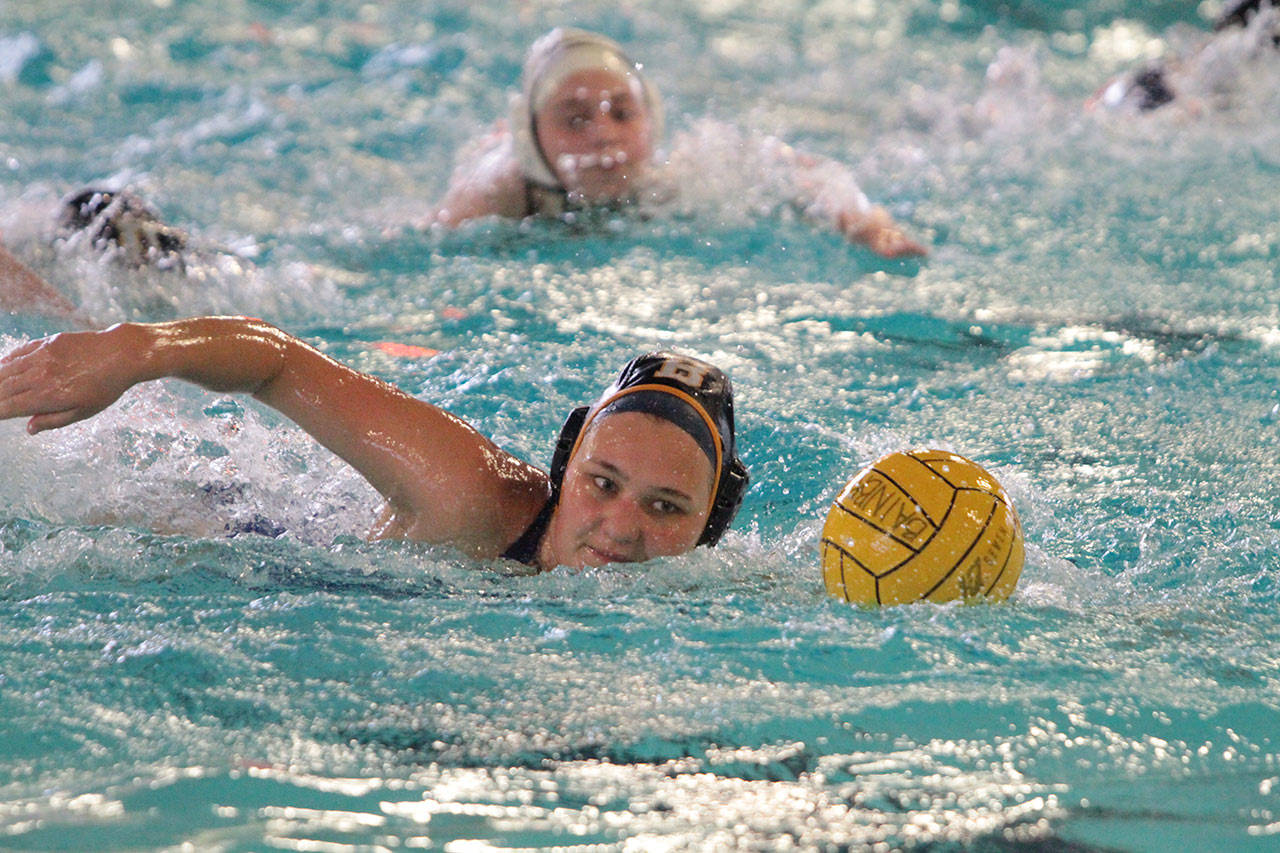 The Spartans Grace Carson moves the ball forward for Bainbridge in recent action against Peninsula. (Brian Kelly | Bainbridge Island Review)