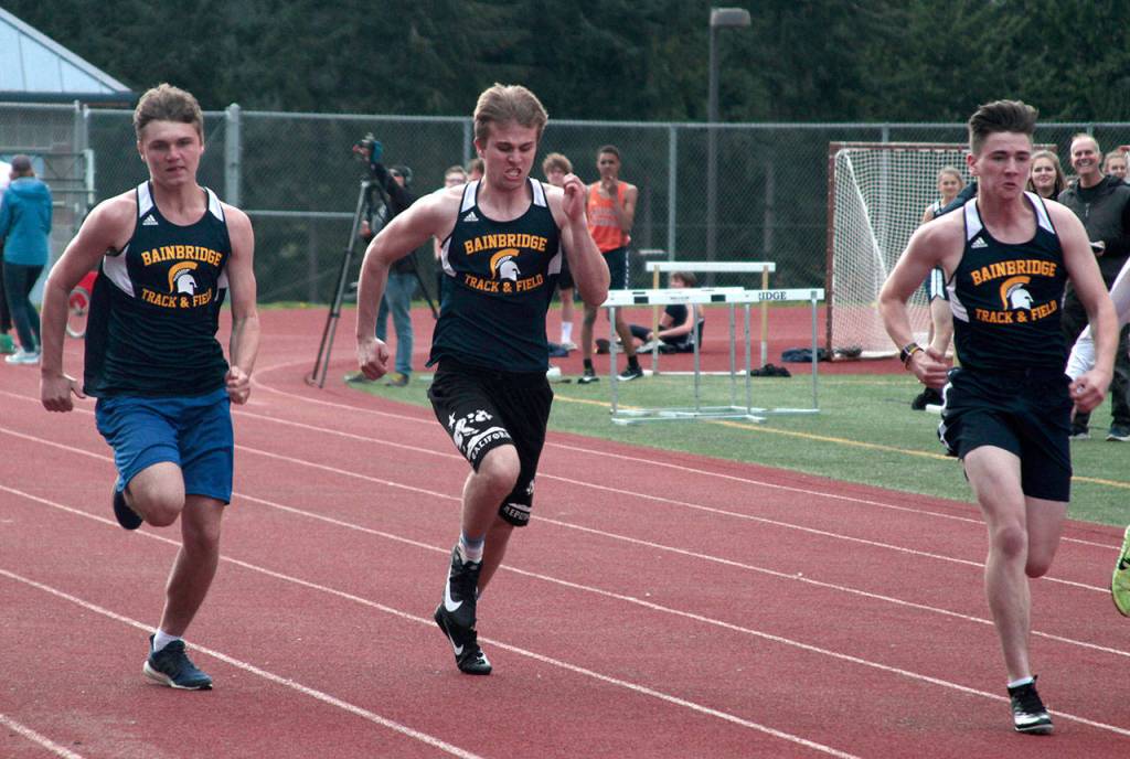 Spartans go fast, high and far at three-school track-and-field meet | Photo gallery