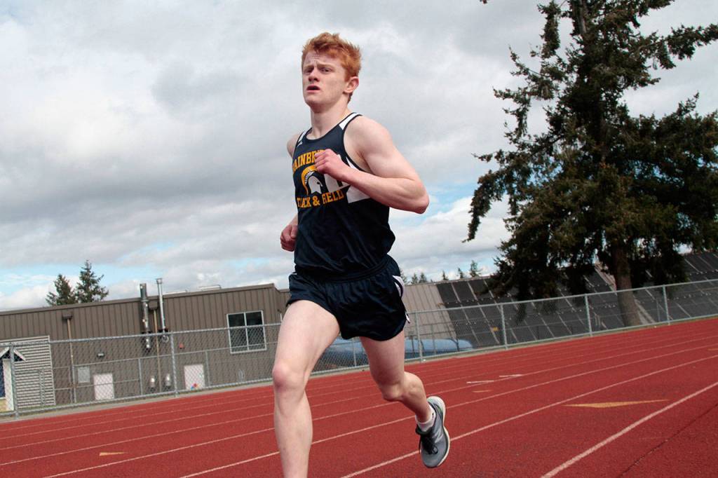 Spartans go fast, high and far at three-school track-and-field meet | Photo gallery