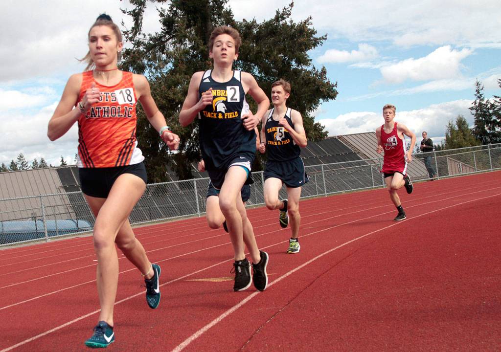 Spartans go fast, high and far at three-school track-and-field meet | Photo gallery