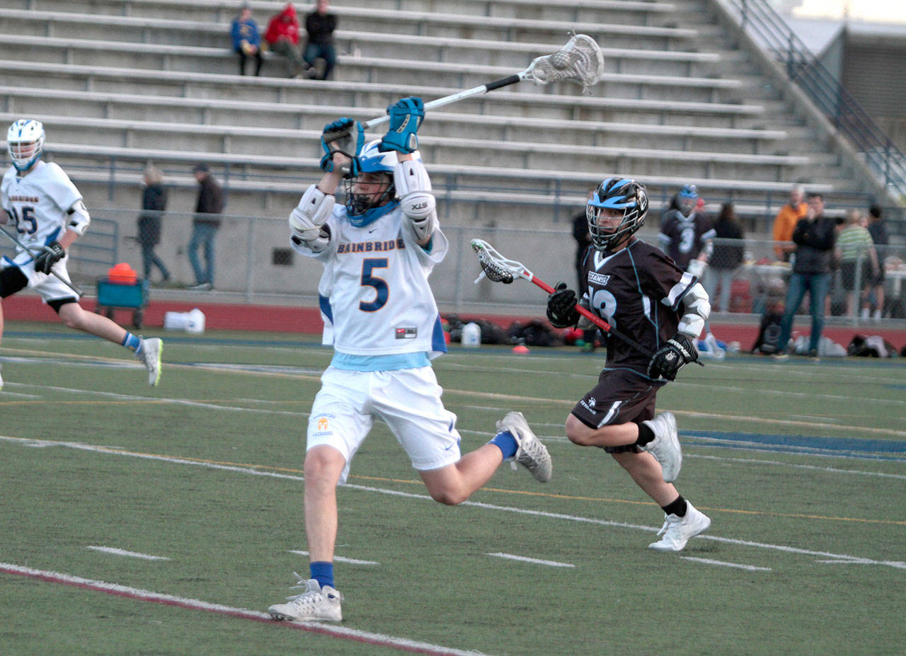 Luciano Marano | Bainbridge Island Review - Spartan sophomore Jaden Mass looks to take a shot at the West Seattle net during a recent home match.