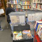 Behind the books: Friends of the Library stage massive sorting, shelving operation