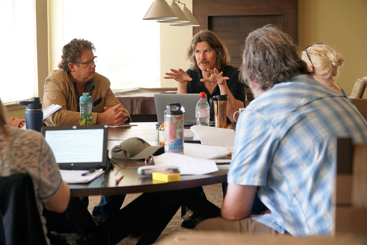 Luciano Marano | Bainbridge Island Review - The cast of the upcoming production of Dancing at Lughnasa, the third show in the Irish Play Series, works through a recent table reading of the script, led by director Wilson Milam.