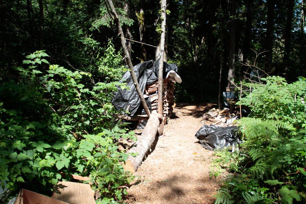 Final days for homeless camp near Highway 305 | Photo gallery