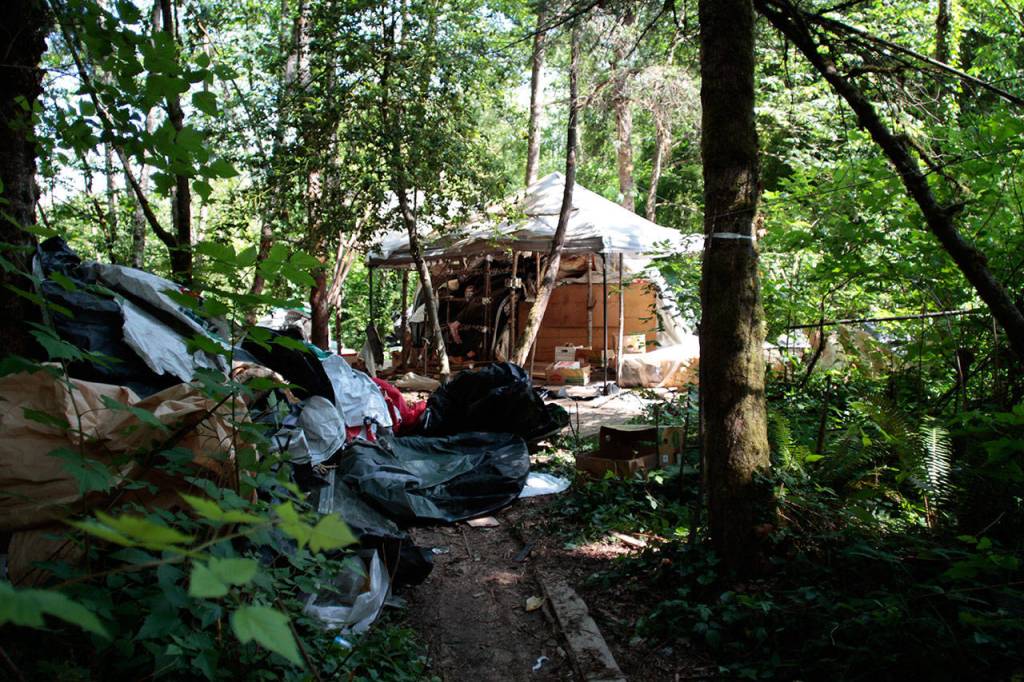 Final days for homeless camp near Highway 305 | Photo gallery