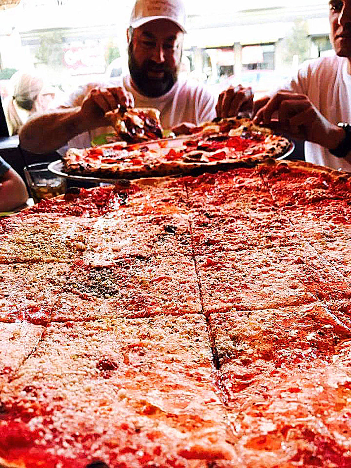 Photo courtesy of Will Grant | Thats A Some Pizzas owner Will Grant does some tasty research during a trip to a prestigious pizza college in San Francisco in 2017. Earlier this year he competed at the World Pizza Championships in Parma, Italy, placing third for Americans overall (and the only high-ranked chef from the Pacific Northwest) in the Duo Competition, where he teamed up with Houston, Texas-based pizza master Nicole Bean.                                 Photo courtesy of Will Grant | Thats A Some Pizzas owner Will Grant does some tasty research during a trip to a prestigious pizza college in San Francisco in 2017. Earlier this year he competed at the World Pizza Championships in Parma, Italy, placing third for Americans overall (and the only high-ranked chef from the Pacific Northwest) in the Duo Competition, where he teamed up with Houston, Texas-based pizza master Nicole Bean.