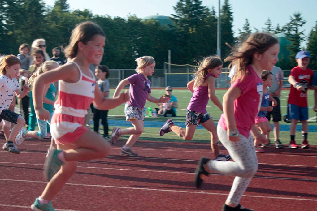 A speedy start: Year’s first All-Comers Track Meet draws eager crowd | Photo gallery