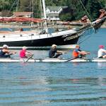 The Thom passes by Waterfront Park in Poulsbo. Thom was the winning eight in the inaugural Kitsap Invitational Masters Summer Scrimmage. (Mark Krulish | Kitsap News Group)