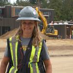 Luciano Marano | Bainbridge Island Review - Alison Ali Dennison, senior engineering geologist for Aspect Consulting, one of the companies behind the new Captain Johnston Blakely Elementary School, and mother of two Blakely students, stands before the new, in-progress facility.
