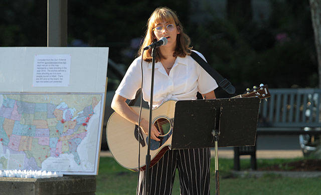 Bainbridge says ‘Enough’ at vigil against gun violence | Photo gallery