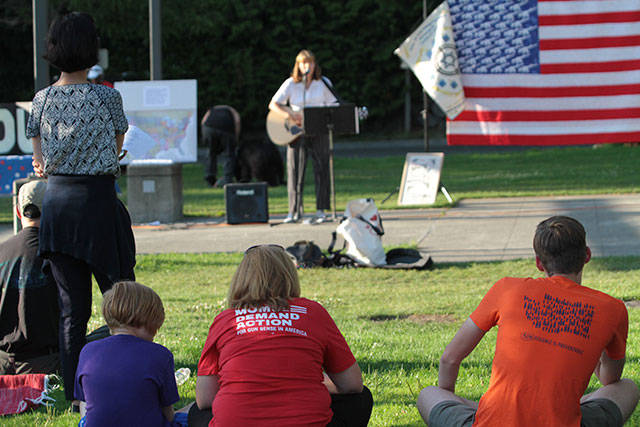 Bainbridge says ‘Enough’ at vigil against gun violence | Photo gallery