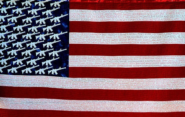 Bainbridge says ‘Enough’ at vigil against gun violence | Photo gallery