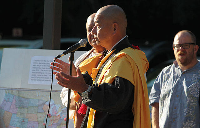 Bainbridge says ‘Enough’ at vigil against gun violence | Photo gallery