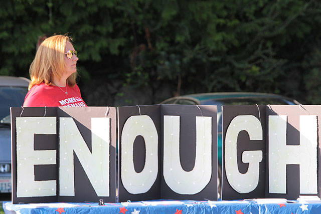 Bainbridge says ‘Enough’ at vigil against gun violence | Photo gallery