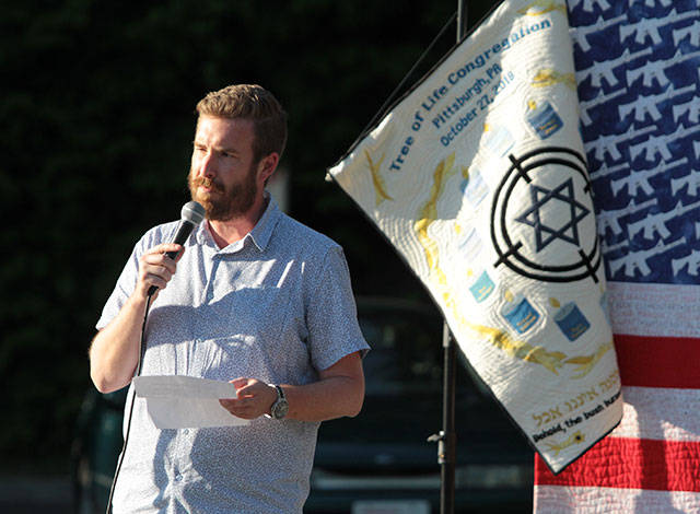Bainbridge says ‘Enough’ at vigil against gun violence | Photo gallery