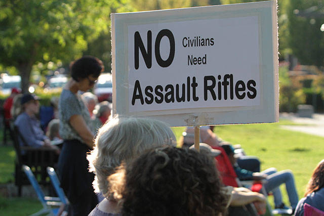 Bainbridge says ‘Enough’ at vigil against gun violence | Photo gallery