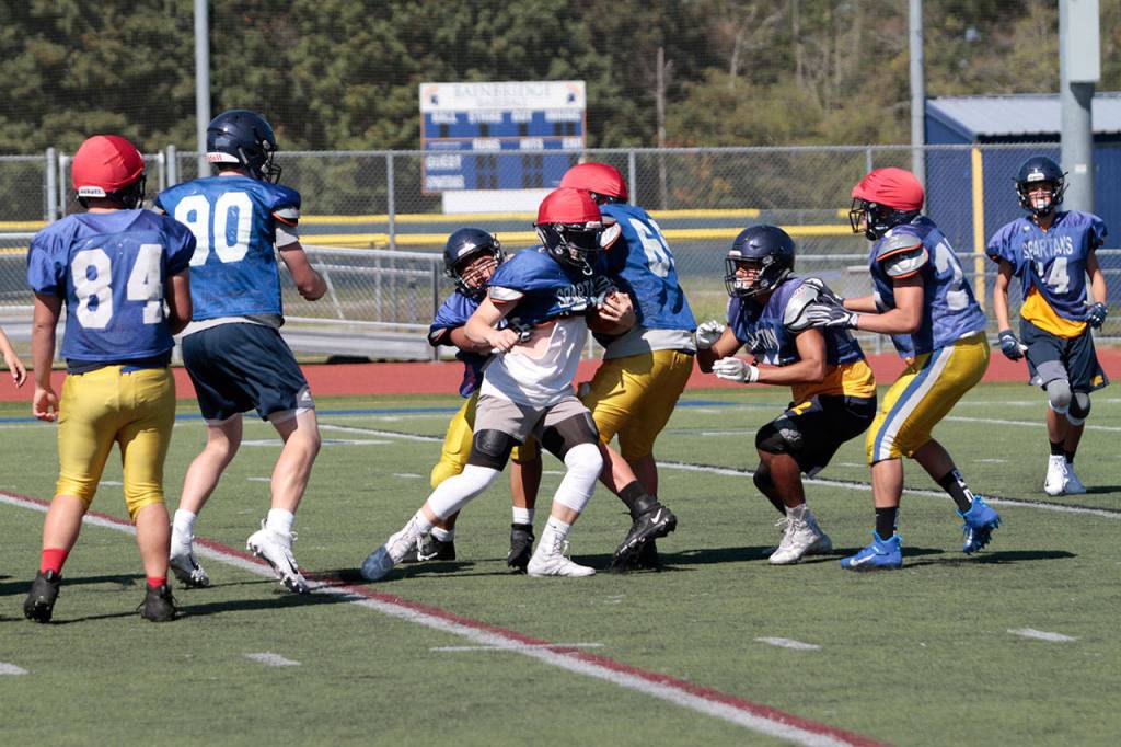 It’s tacklin’ time: Spartans get set for first football outing | Photo gallery