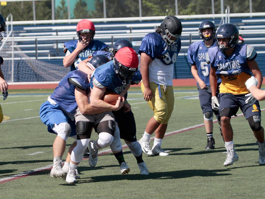 It’s tacklin’ time: Spartans get set for first football outing | Photo gallery