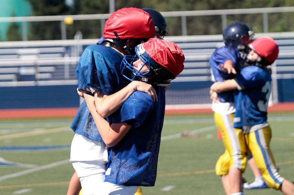 It’s tacklin’ time: Spartans get set for first football outing | Photo gallery