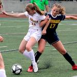 Bainbridge claims big comeback win in season opener