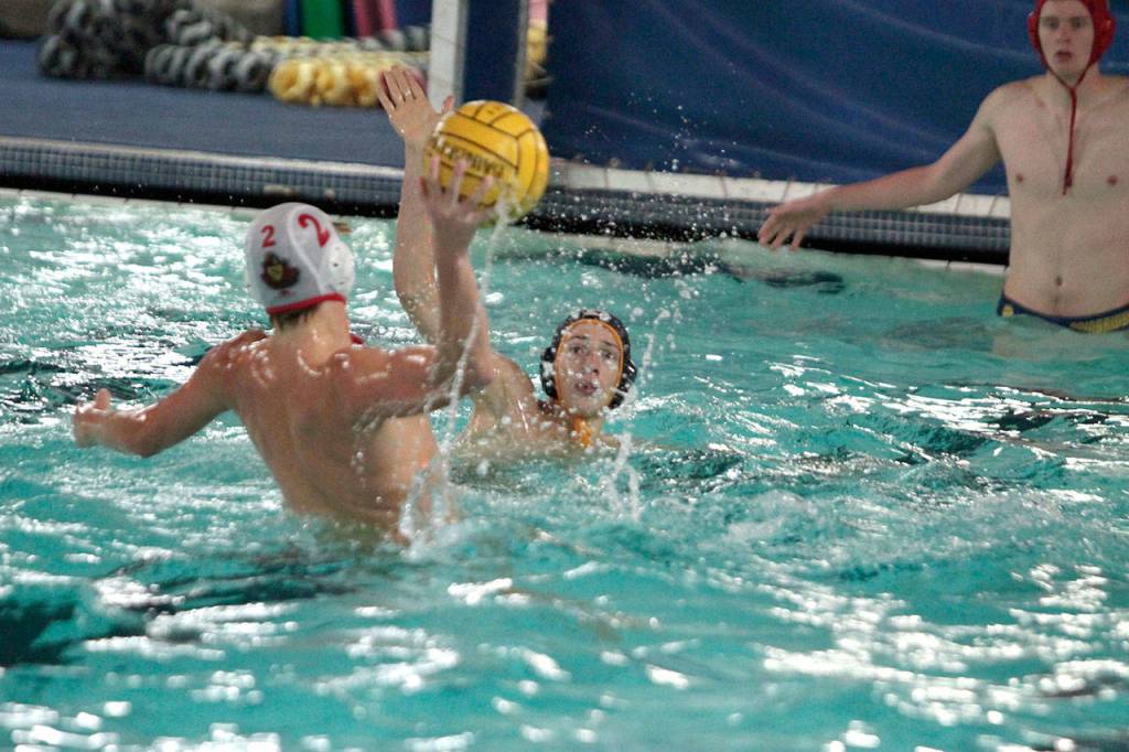 Bainbridge boys splash, shoot to water polo win against Newport | Photo gallery
