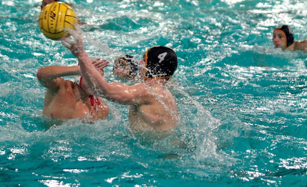 Bainbridge boys splash, shoot to water polo win against Newport | Photo gallery